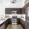 modern kitchen with stainless steel appliances and wooden cabinets
