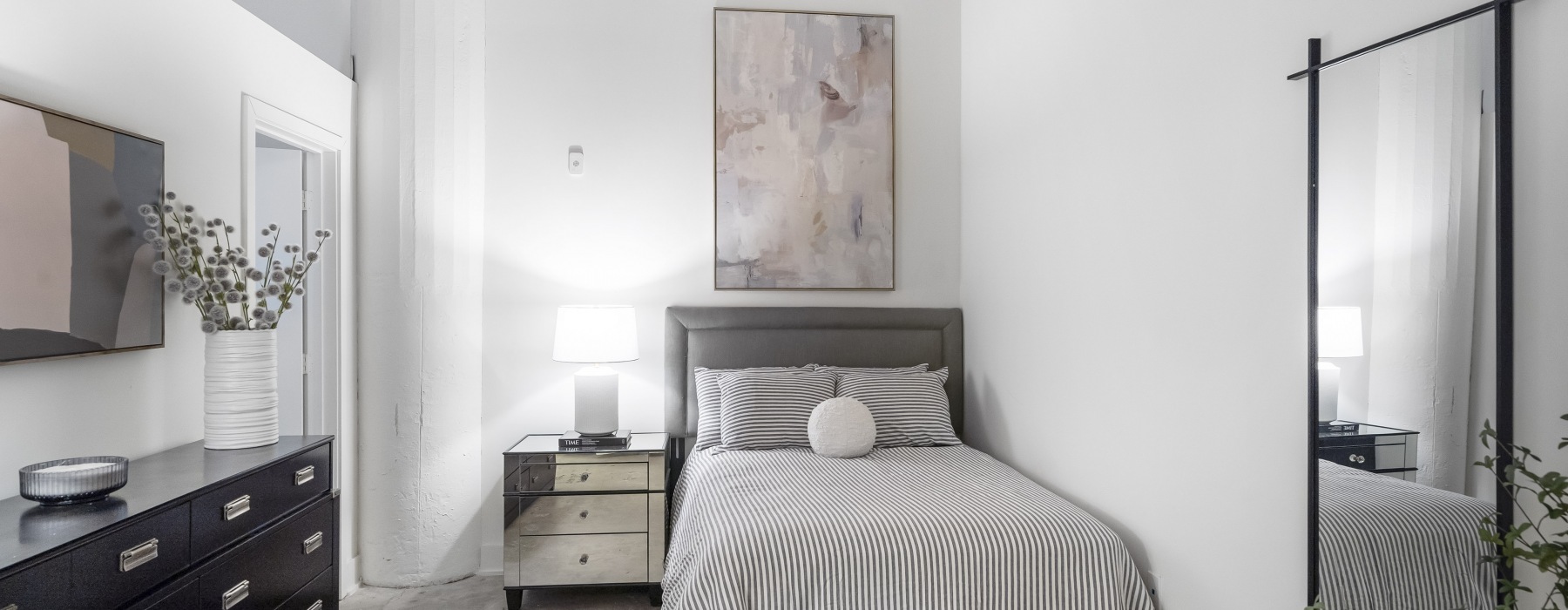 bedroom with grey bedding